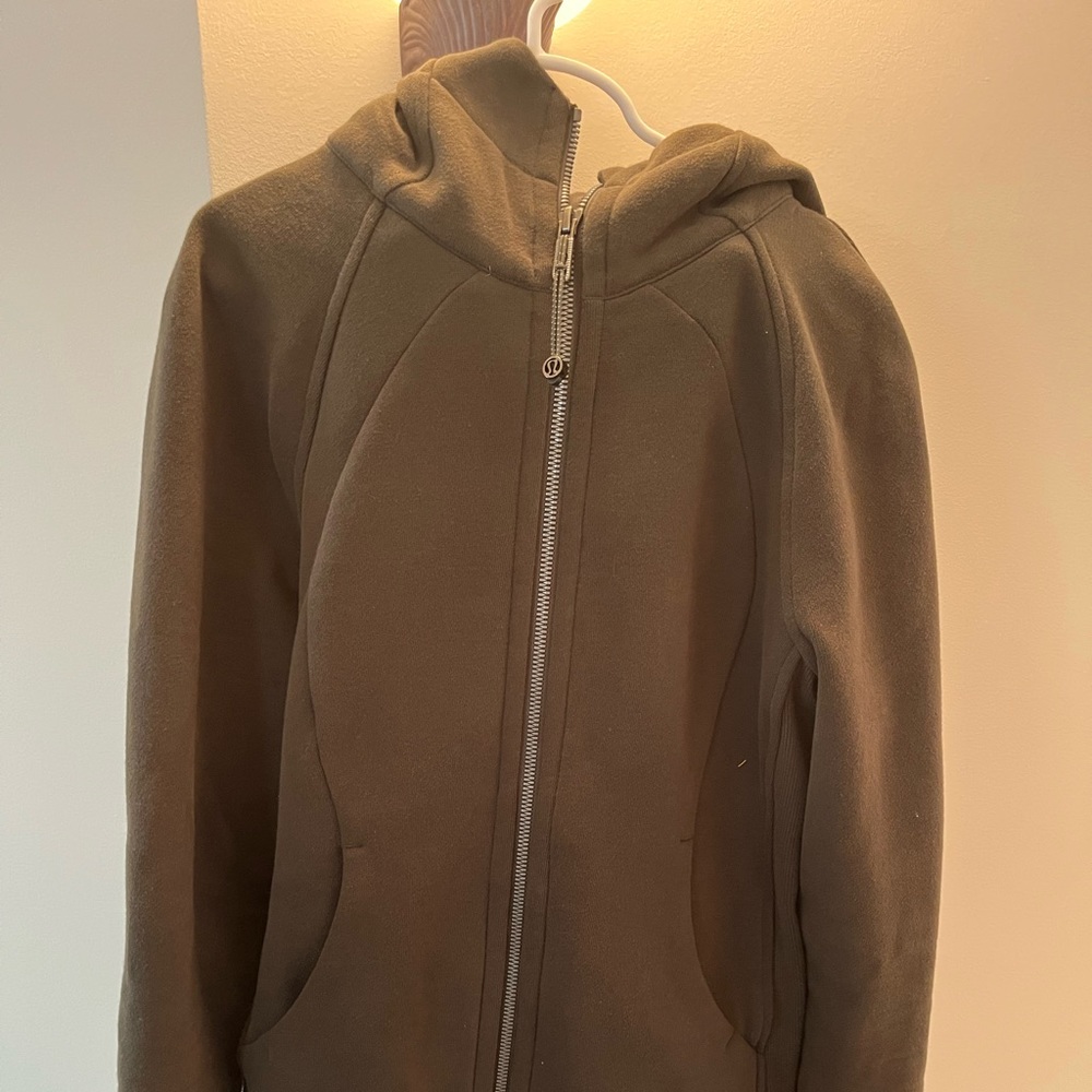 Lululemon Define Jacket- women size 4.   Khaki color Lululemon jacket with hood.